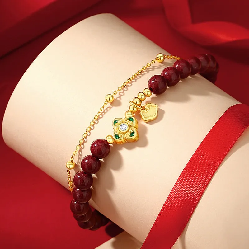 Sterling silver women's bracelet with geometric Ruyi and Xiangyun Chinese motifs and cinnabar red flower detailing
