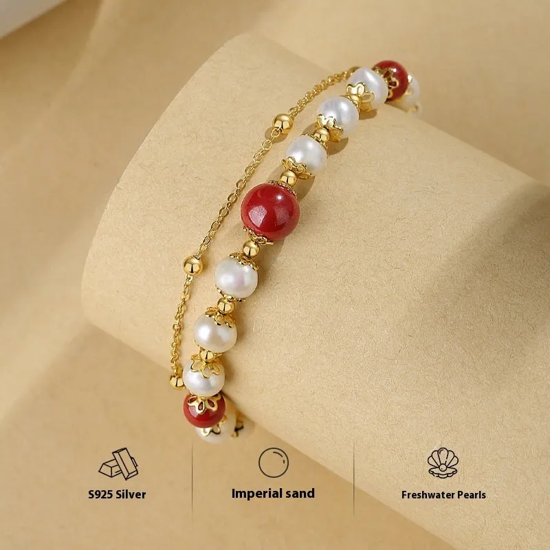 Sterling silver double-layer bracelet with cinnabar red beans and freshwater pearls in geometric design