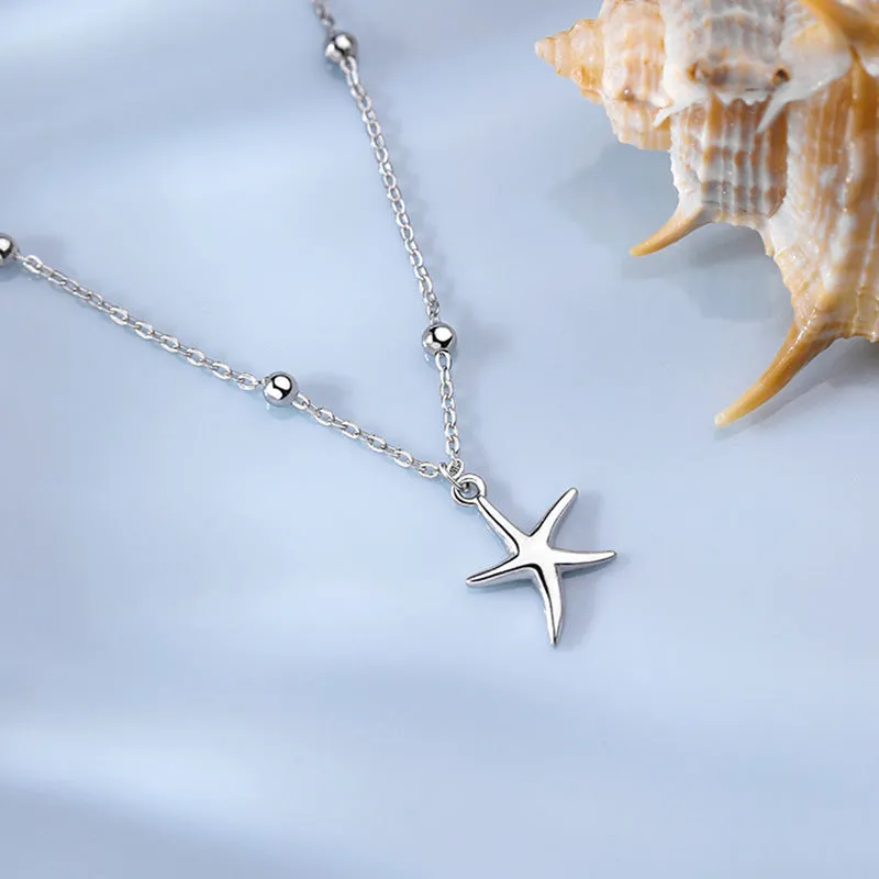 S925 sterling silver adjustable starfish anklet with round beads on an ankle, showing the 1.2 cm charm detail.