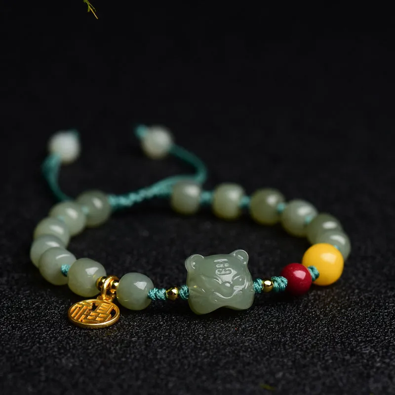 Natural Hetian jade bracelet with red cinnabar and amber beeswax beads, animal zodiac design
