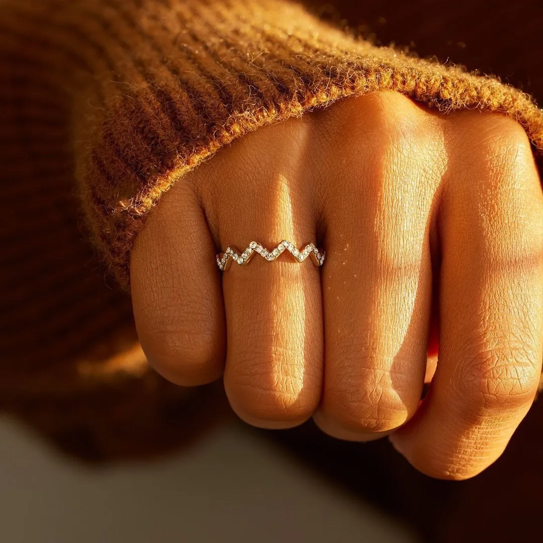 ECG Wave V-shaped zircon ring in gold colour on white background