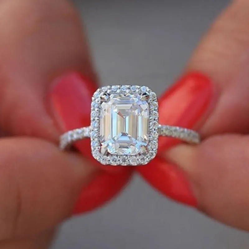 Silver rectangle princess ring with 3.5 carat emulation diamond on geometric band