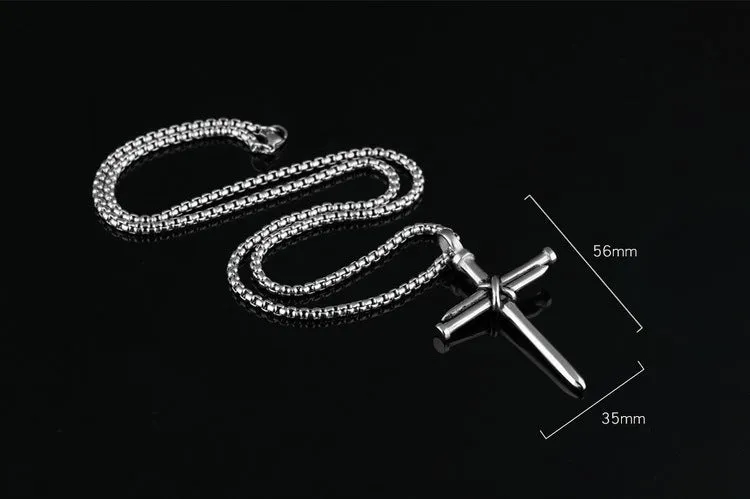 Titanium steel cross nail pendant necklace for men in silver finish on display