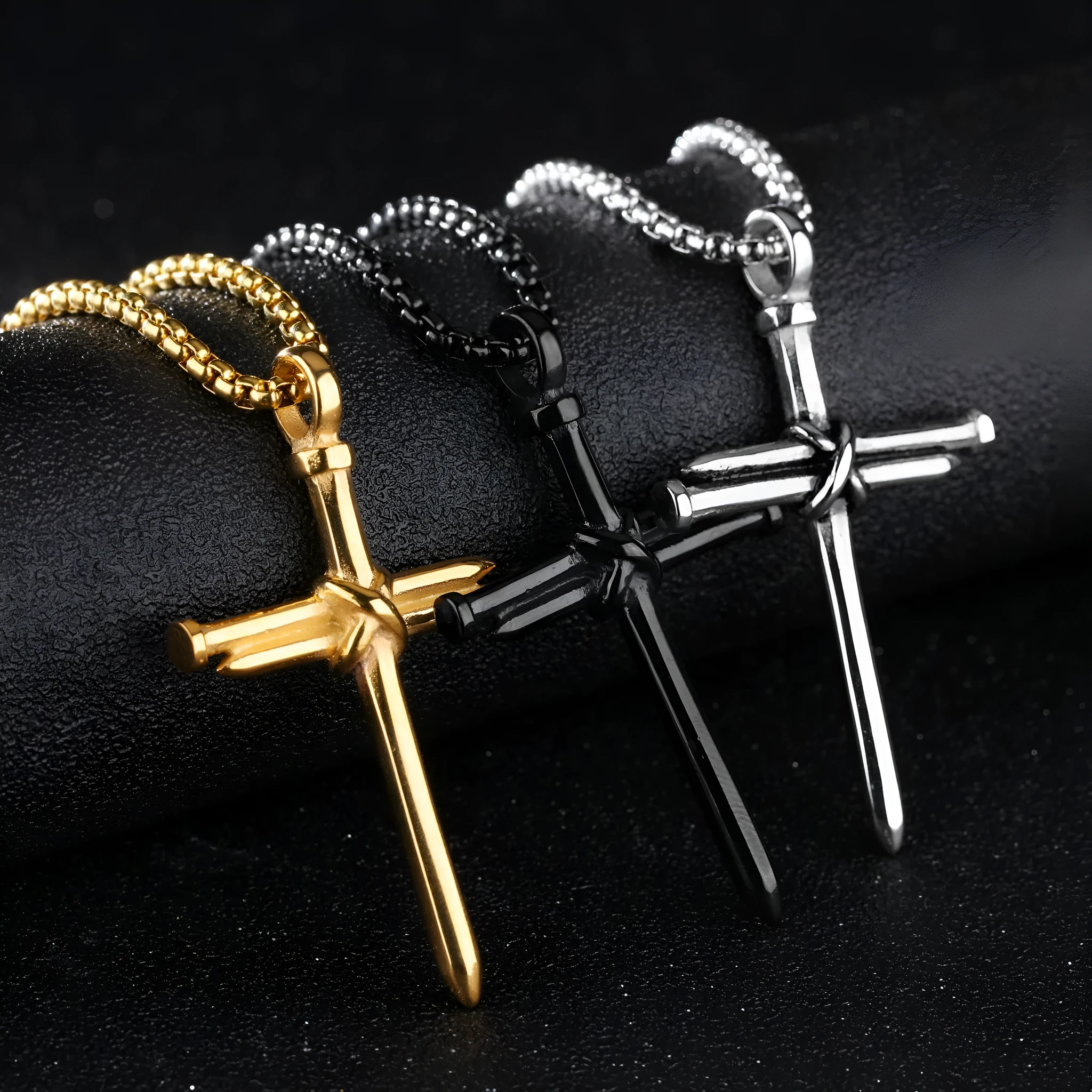 Titanium steel cross nail pendant necklace for men in silver finish on display