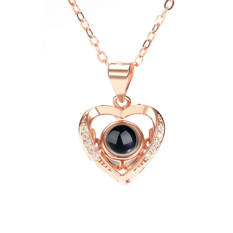 925 silver heart-shaped pendant necklace on cross chain with geometric detail and adjustable length