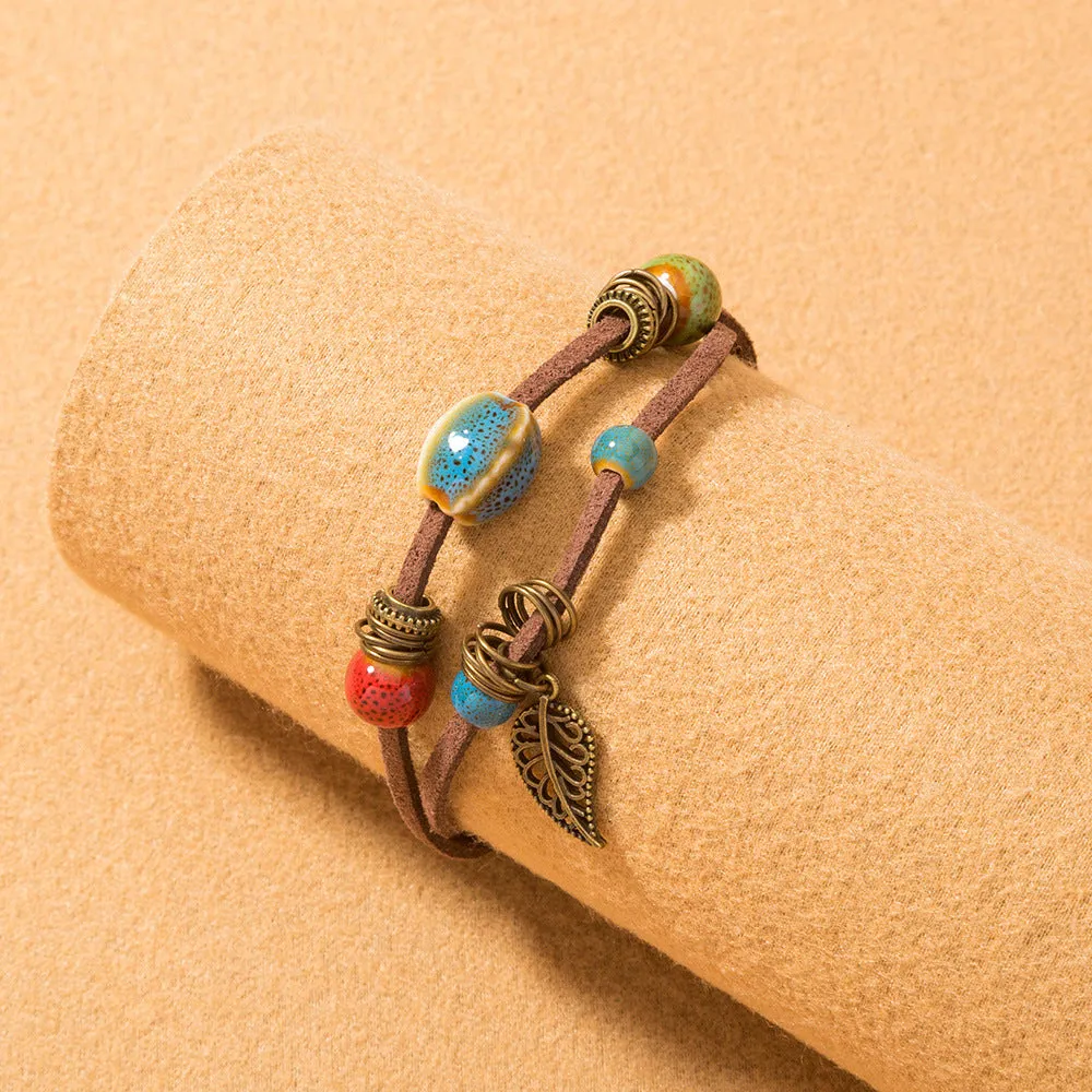 Hand-woven cowhide rope bracelet with blue ceramic beads geometric splicing style
