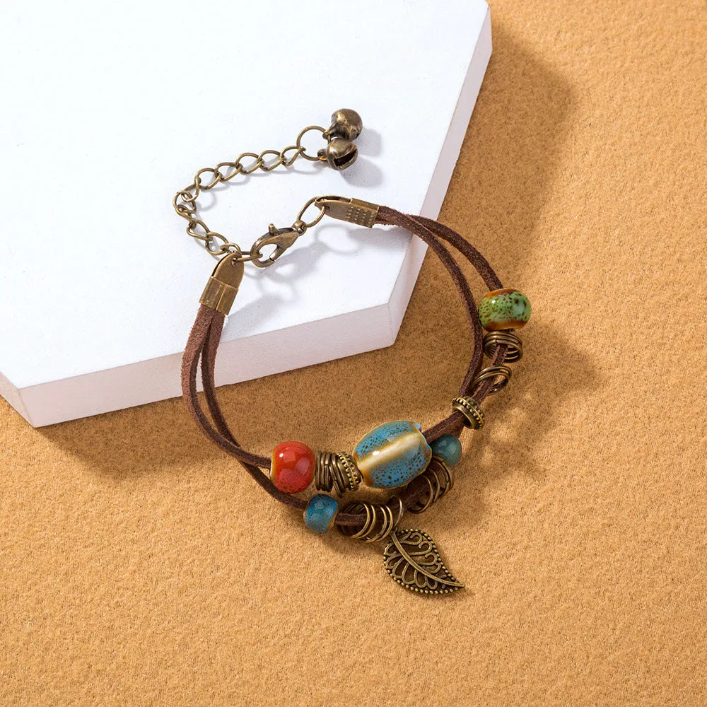 Hand-woven cowhide rope bracelet with blue ceramic beads geometric splicing style