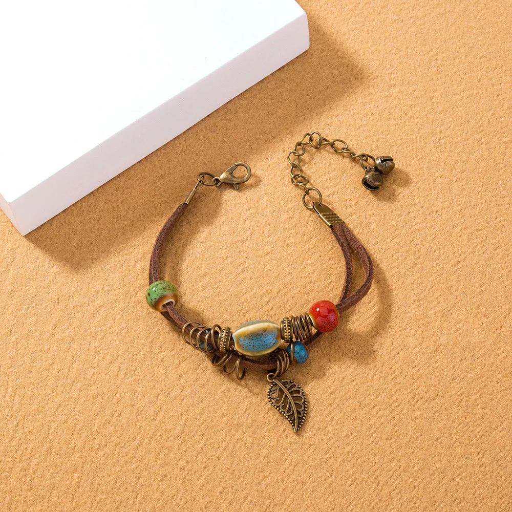 Hand-woven cowhide rope bracelet with blue ceramic beads geometric splicing style