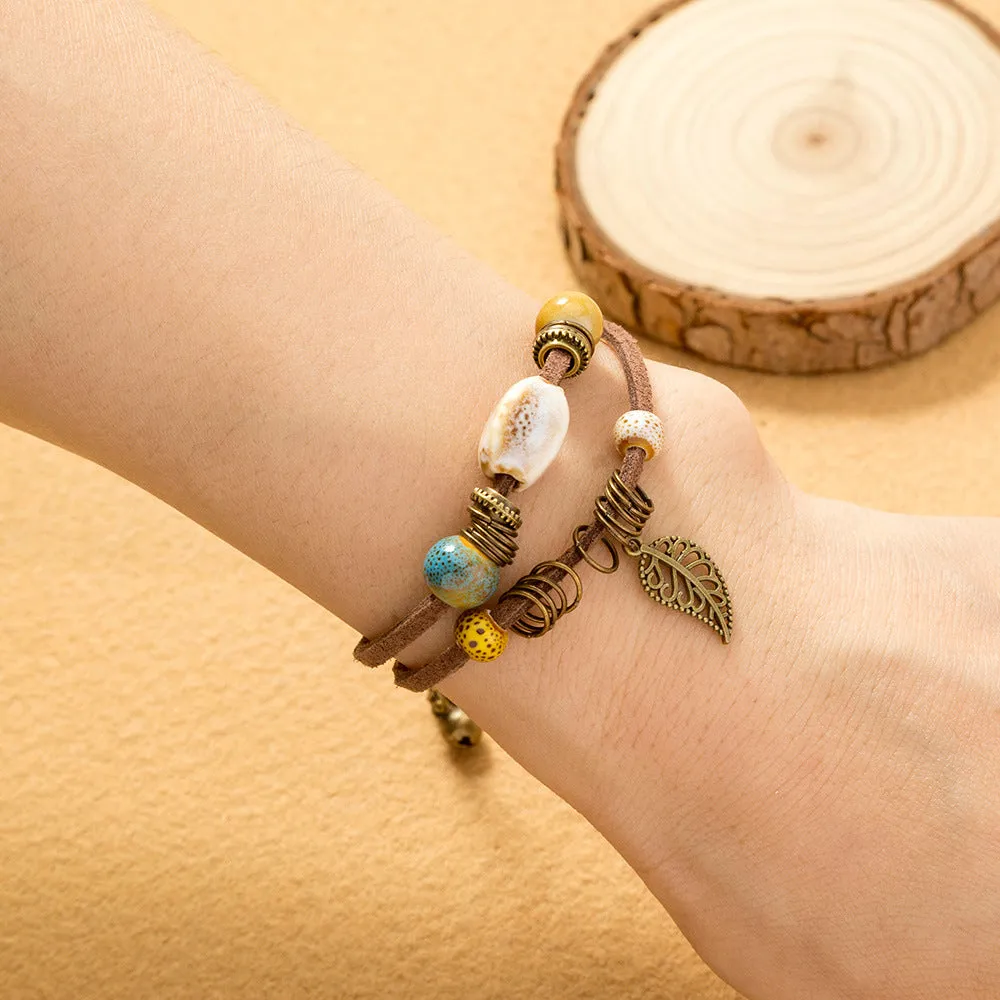 Hand-woven cowhide rope bracelet with blue ceramic beads geometric splicing style