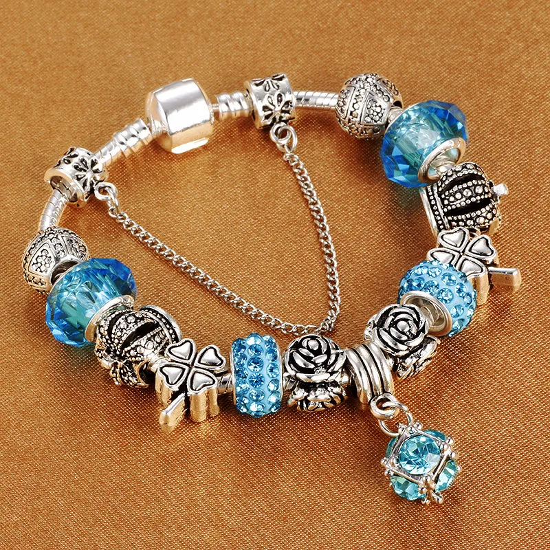 Multicolour beaded bracelet with alloy, glazed, and diamond beads on a white background