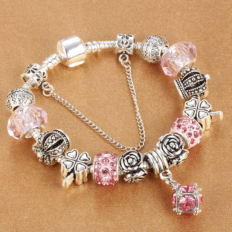 Multicolour beaded bracelet with alloy, glazed, and diamond beads on a white background