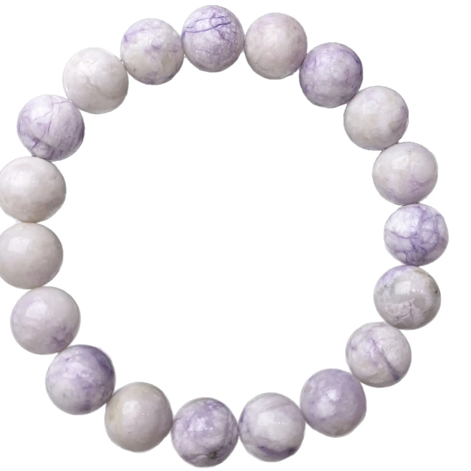 Women's purple turquoise stone bracelet with natural beads on a wrist.