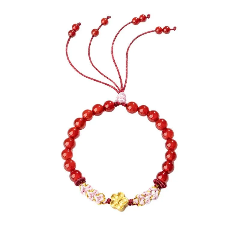 Hand-woven red rope bracelet with diamond shaped crystal and peach blossom Chinese design