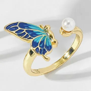 Butterfly-shaped pearl ring in imitation gold on adjustable alloy band