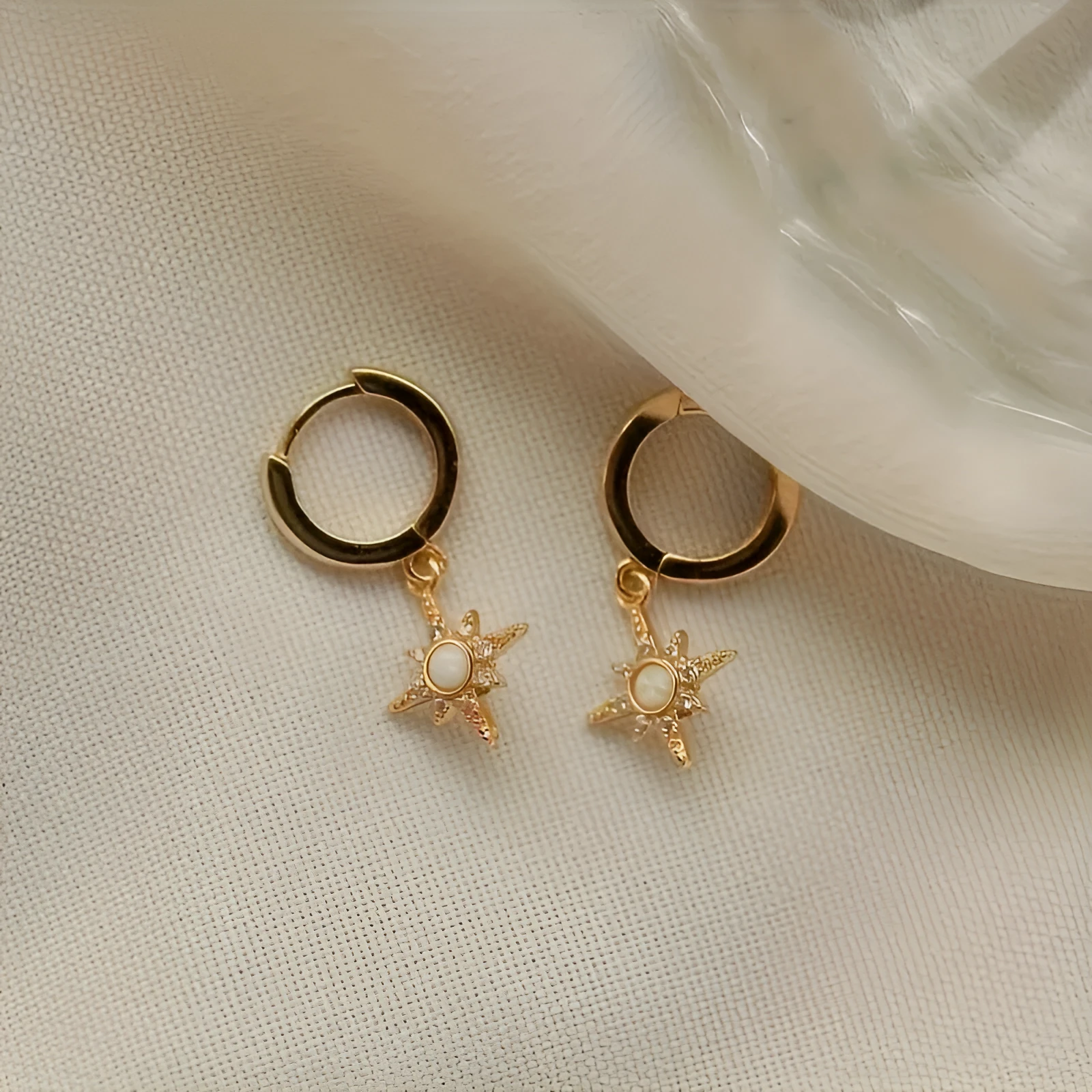 Gold eight-pointed star opal earrings for women, copper base, geometric drop style