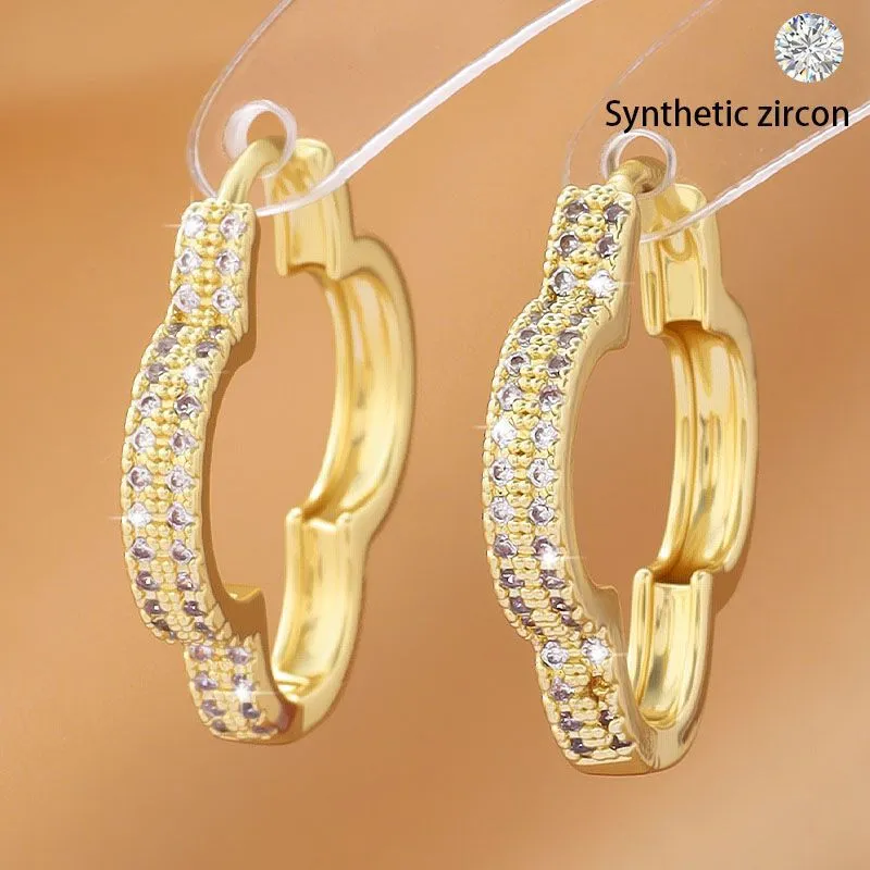 Heart-shaped earrings with micro-inlaid zirconia in gold copper finish for women