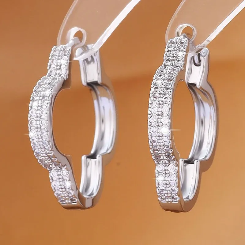 Heart-shaped earrings with micro-inlaid zirconia in gold copper finish for women