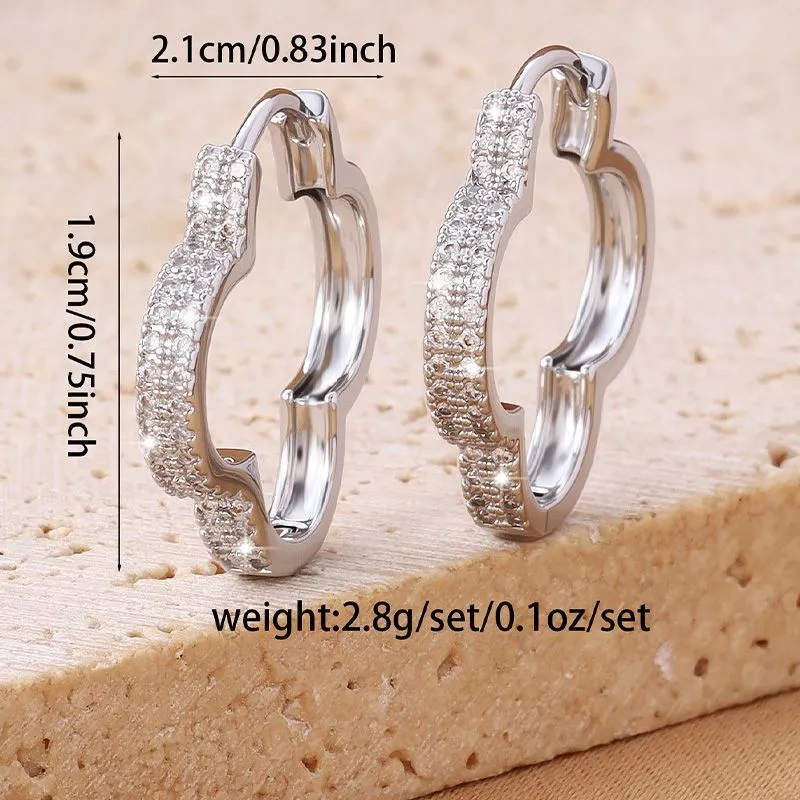 Heart-shaped earrings with micro-inlaid zirconia in gold copper finish for women