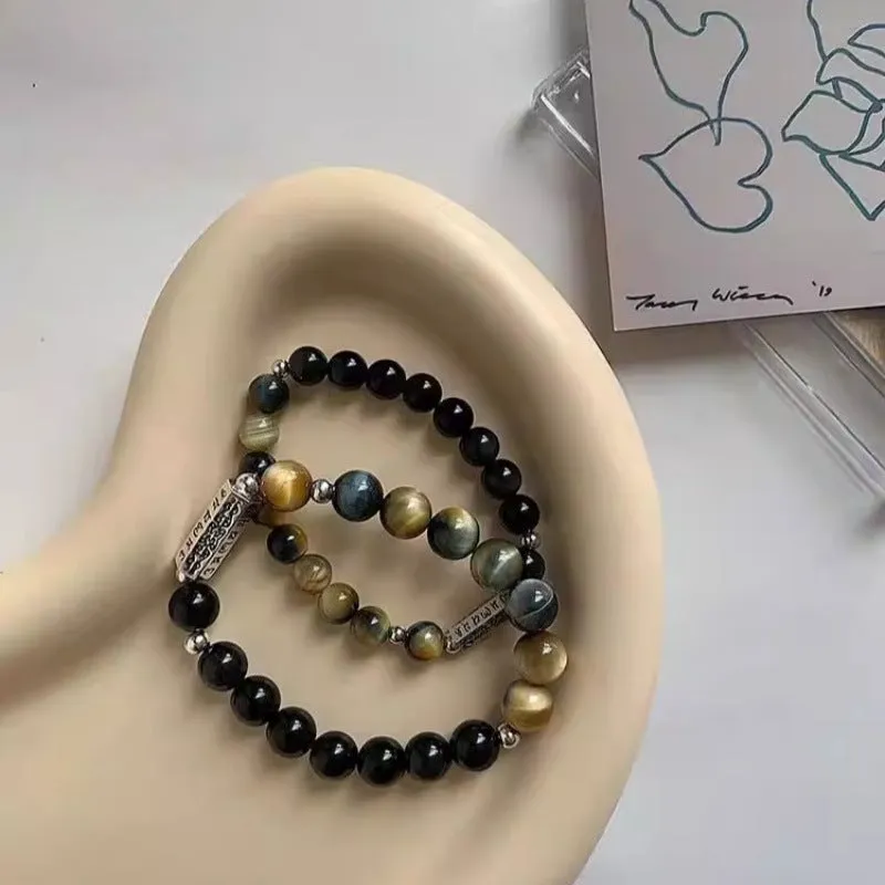 Sterling silver couple bracelet with tigereye obsidian gemstones and six words mantra design.