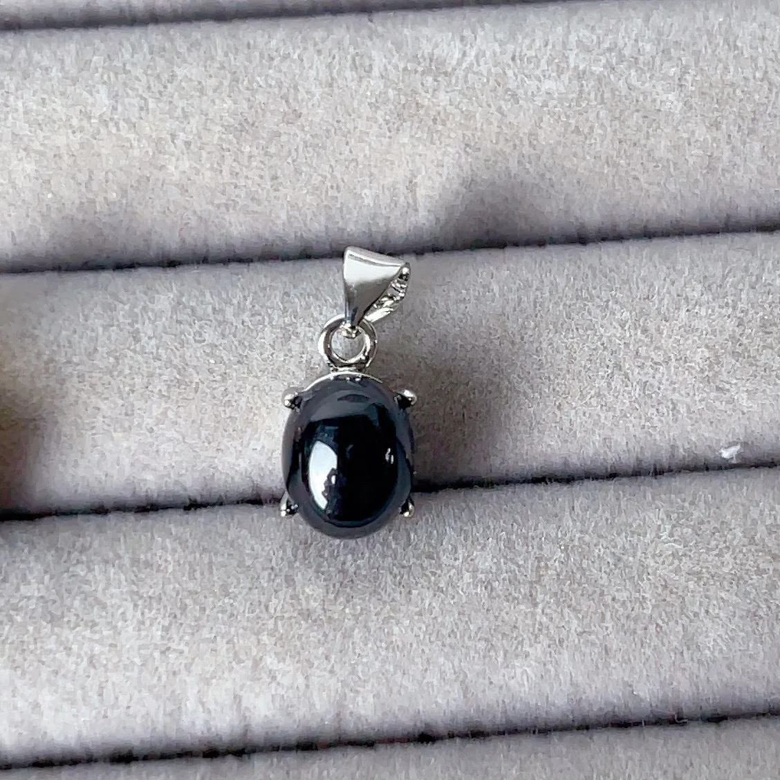 Copper open ring with crystal inlay, geometric shape, black tourmaline colour, on white background