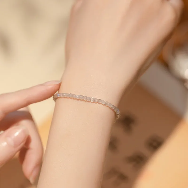 Natural gray moonstone diamond-shaped beads on a silver bracelet with clasp