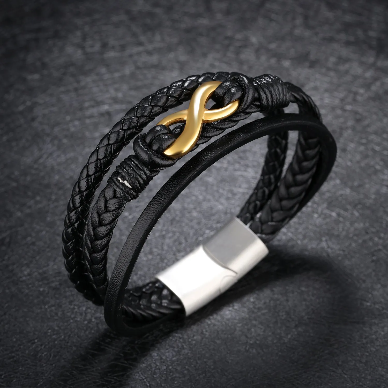 Black vintage leather bracelet with titanium steel clasp on display, 20cm length