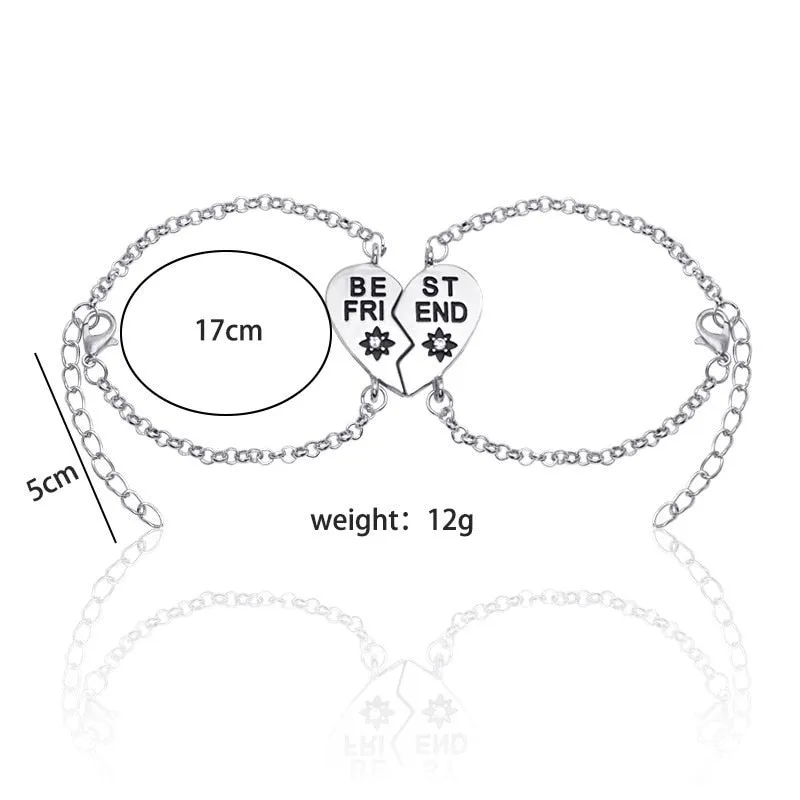 Heart shape alloy bracelet with dripping oil finish and inlaid gems in gold and silver colours