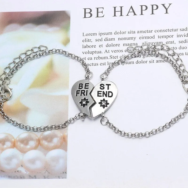 Heart shape alloy bracelet with dripping oil finish and inlaid gems in gold and silver colours