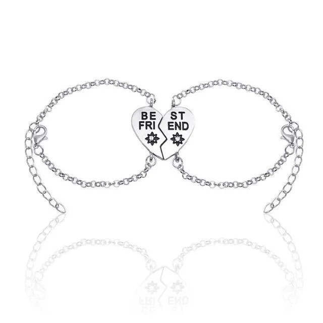 Heart shape alloy bracelet with dripping oil finish and inlaid gems in gold and silver colours