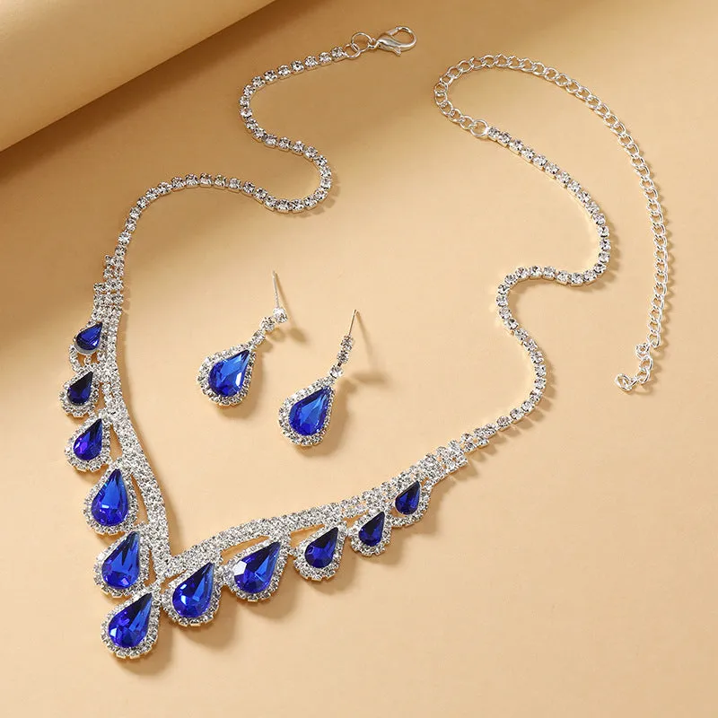 Royal Blue White K alloy jewellery set with a regular chain necklace and earrings on display