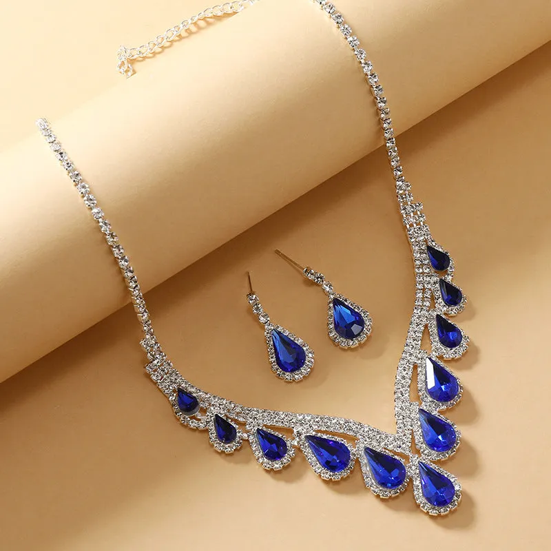 Royal Blue White K alloy jewellery set with a regular chain necklace and earrings on display