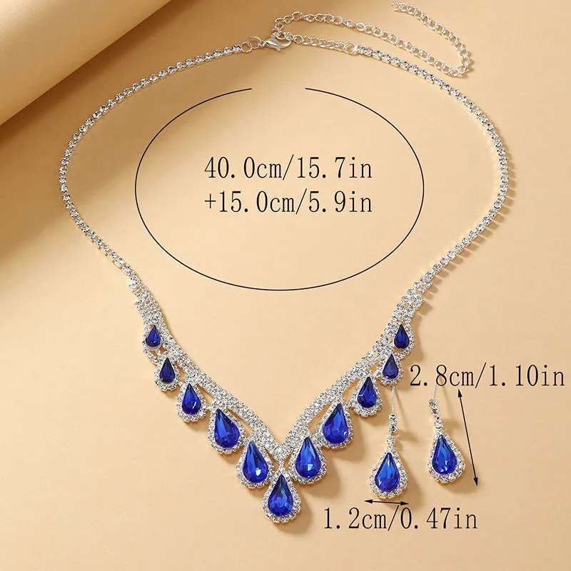Royal Blue White K alloy jewellery set with a regular chain necklace and earrings on display