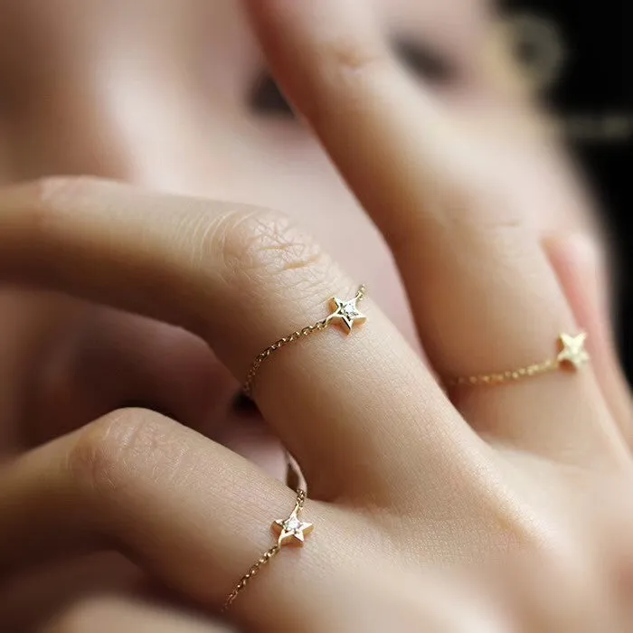 18K yellow gold adjustable star ring with two diamonds on hand, women's light luxury design
