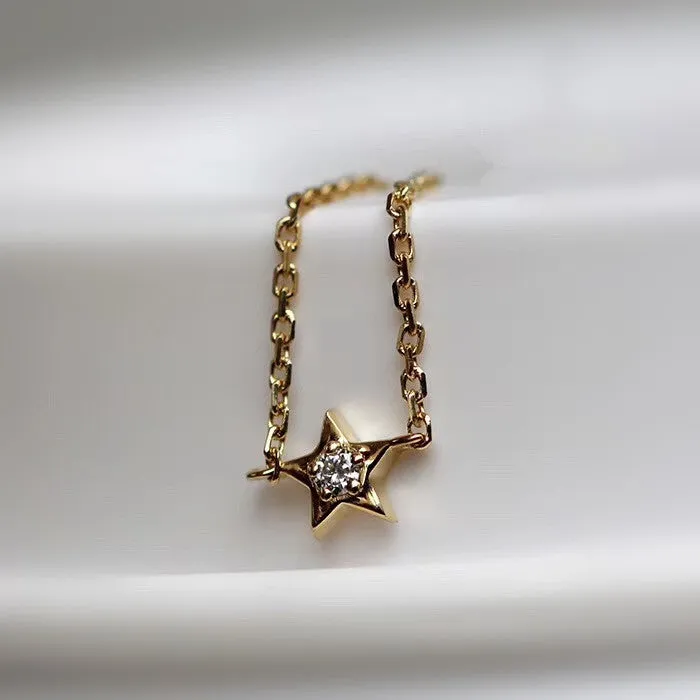 18K yellow gold adjustable star ring with two diamonds on hand, women's light luxury design