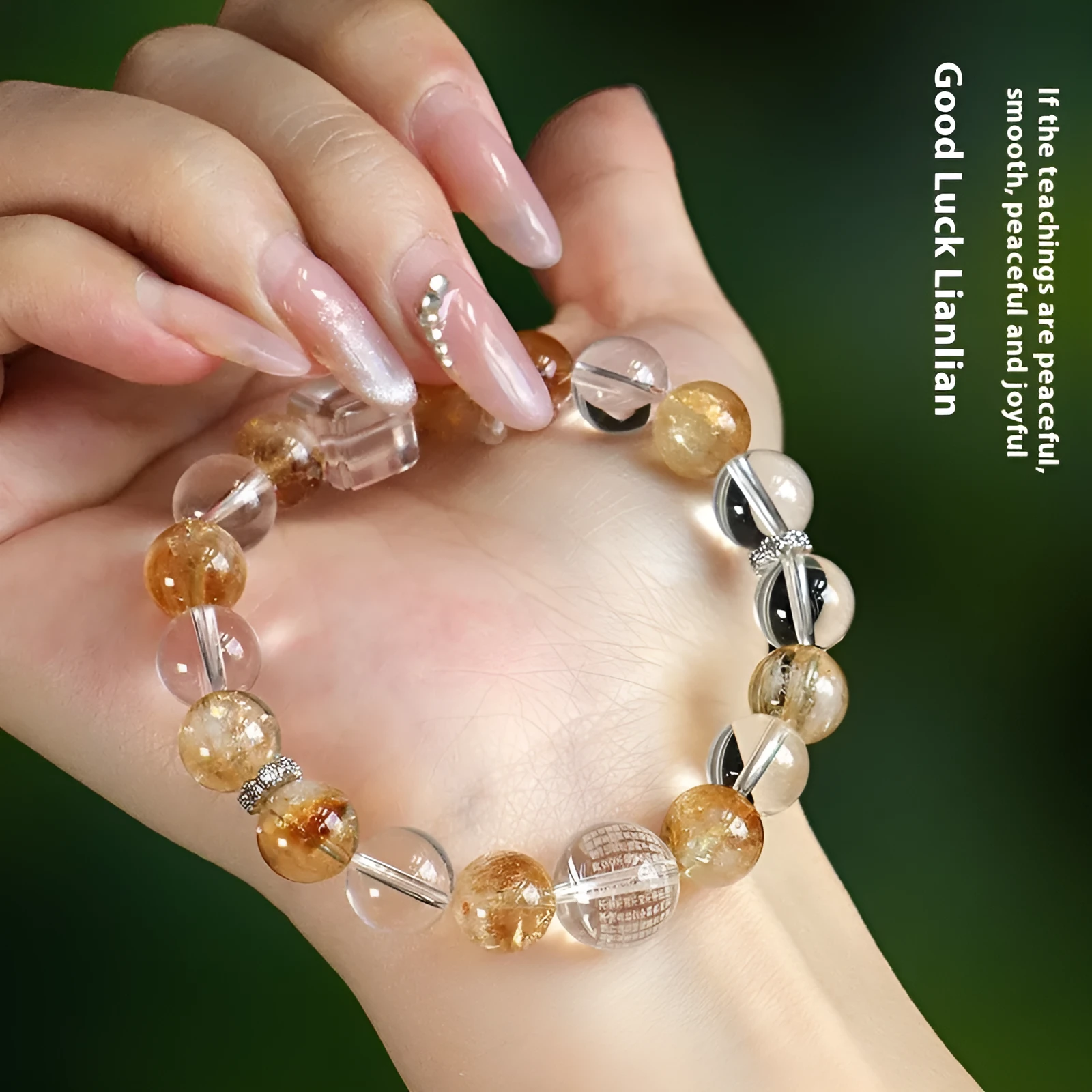 Handmade women's bracelet with white crystal beads, freshwater pearls, and yellow crystal accents