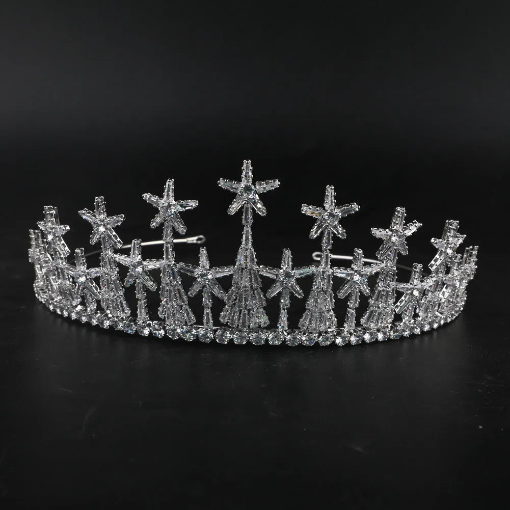 Copper bridal crown with zircon accents in gold finish on a stand