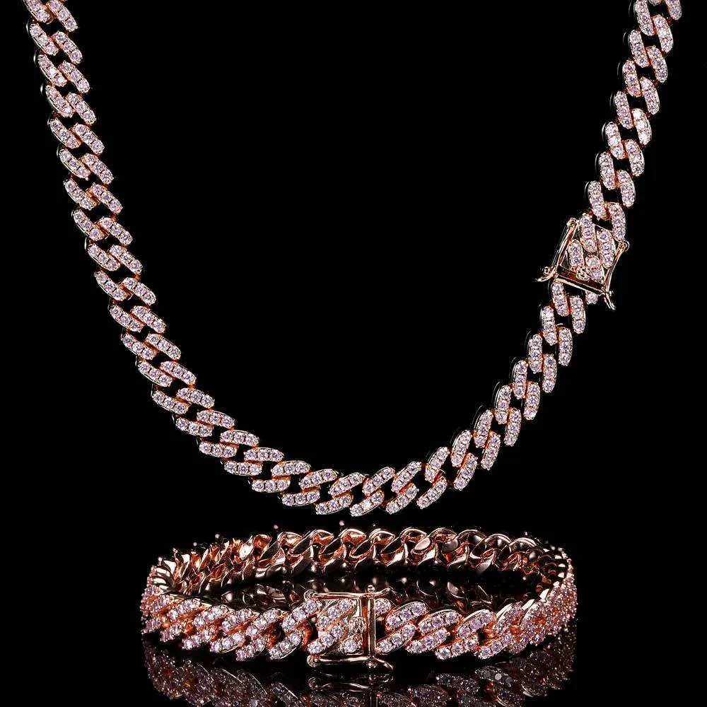 Single row Cuban chain bracelet with AAA zircon set in copper, 9mm width, gold colour, on plain background