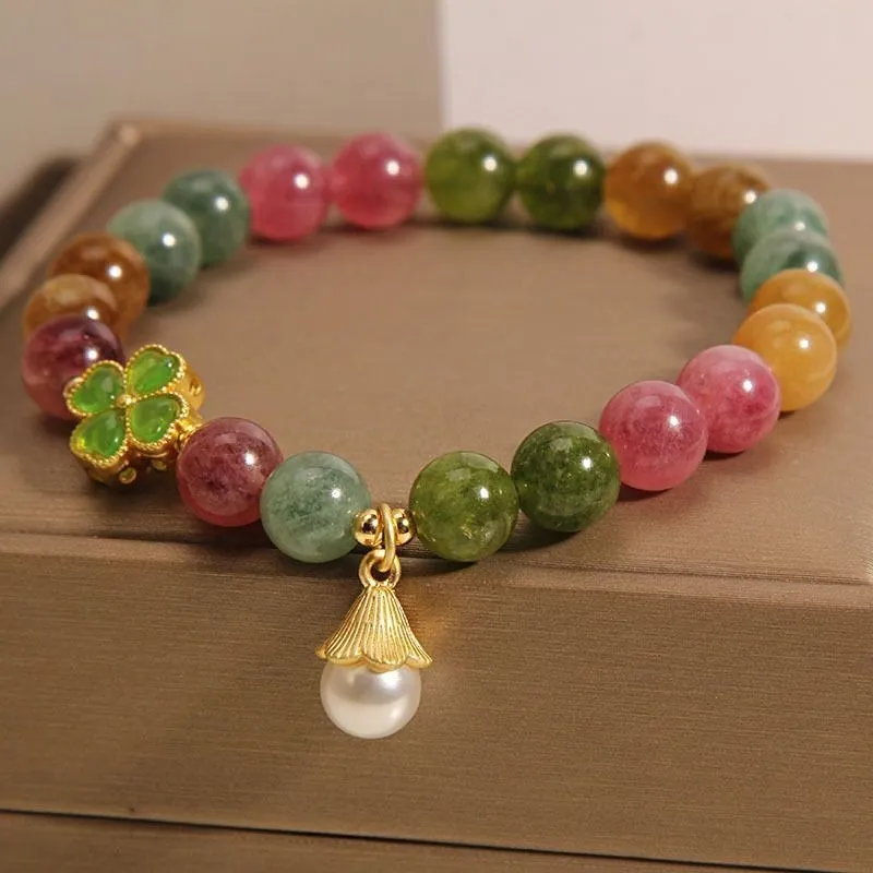 Women's tourmaline bracelet with four-leaf clover pearl pendant and geometric drop-shaped elements