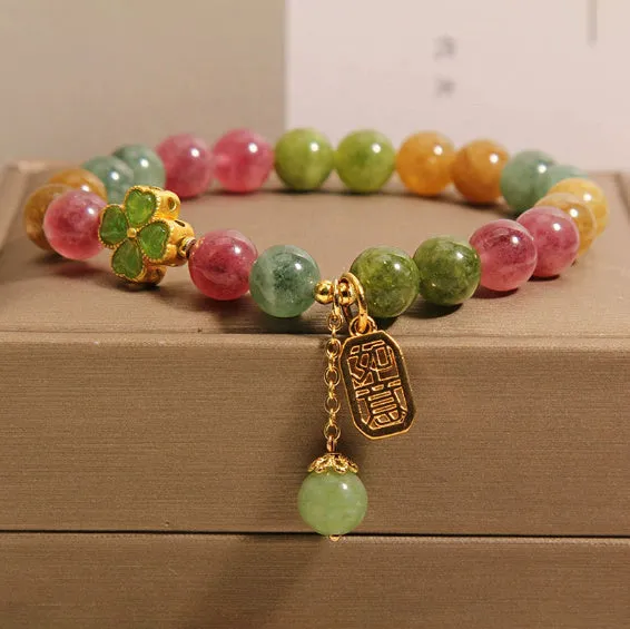 Women's tourmaline bracelet with four-leaf clover pearl pendant and geometric drop-shaped elements