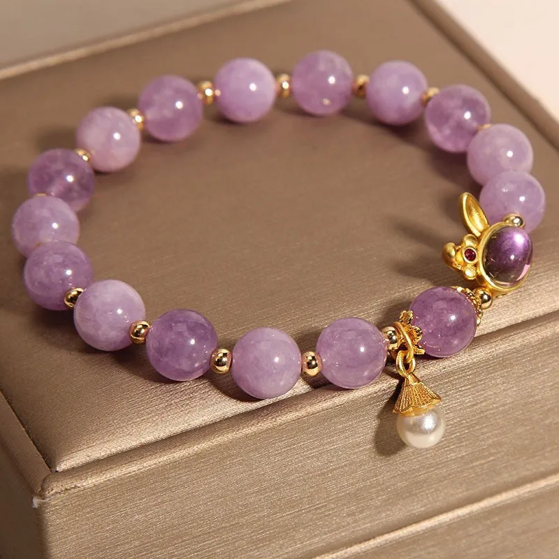 Natural mauve jade hare head crystal bracelet in Mori style with purplish red accents.