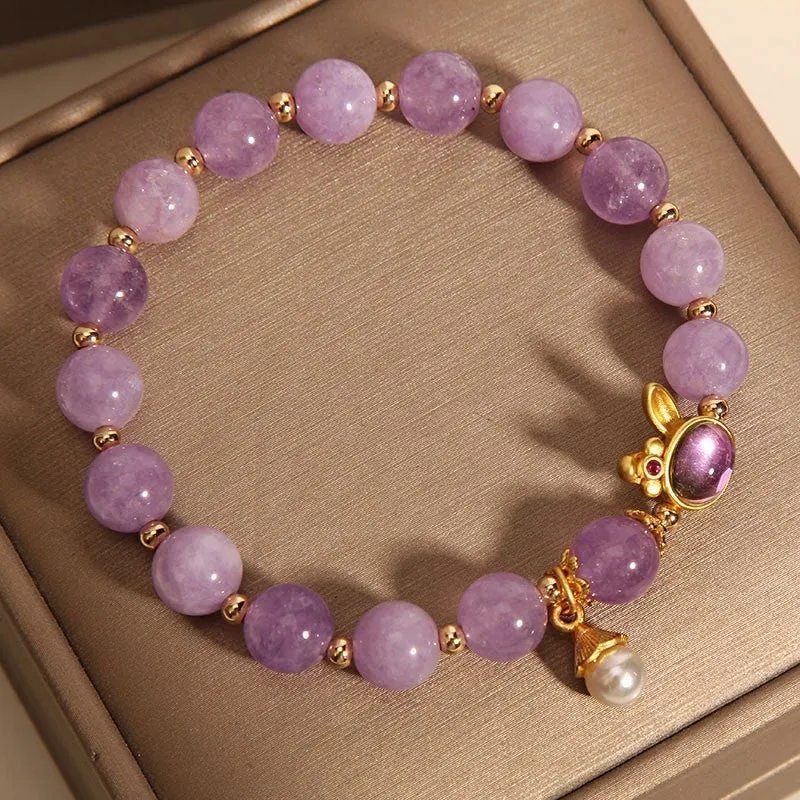 Natural mauve jade hare head crystal bracelet in Mori style with purplish red accents.