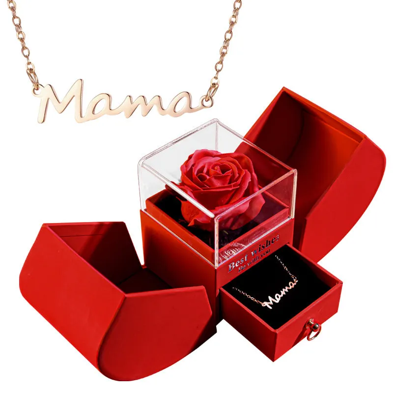 Red eternal rose necklace in apple-shaped jewellery gift box on display