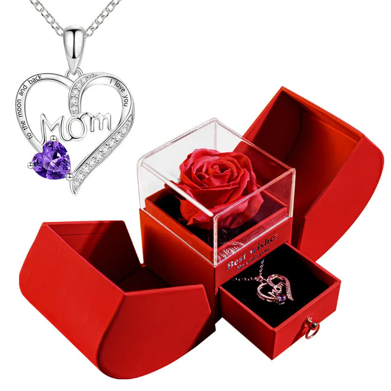 Red eternal rose necklace in apple-shaped jewellery gift box on display