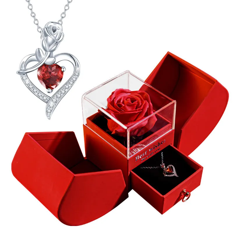Red eternal rose necklace in apple-shaped jewellery gift box on display