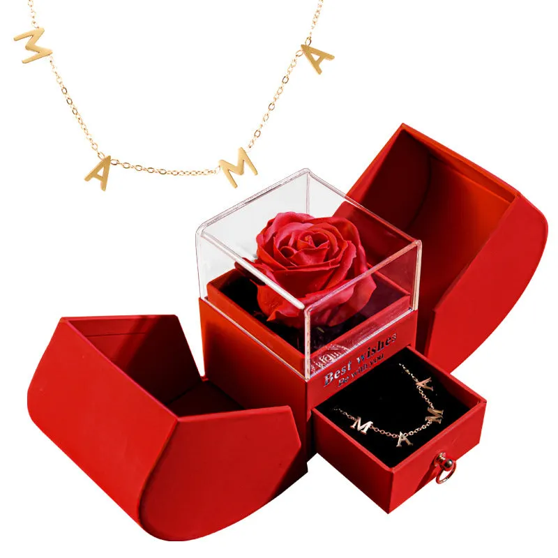 Red eternal rose necklace in apple-shaped jewellery gift box on display