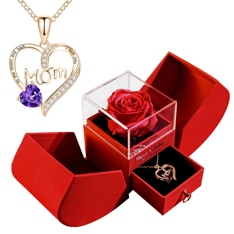 Red eternal rose necklace in apple-shaped jewellery gift box on display
