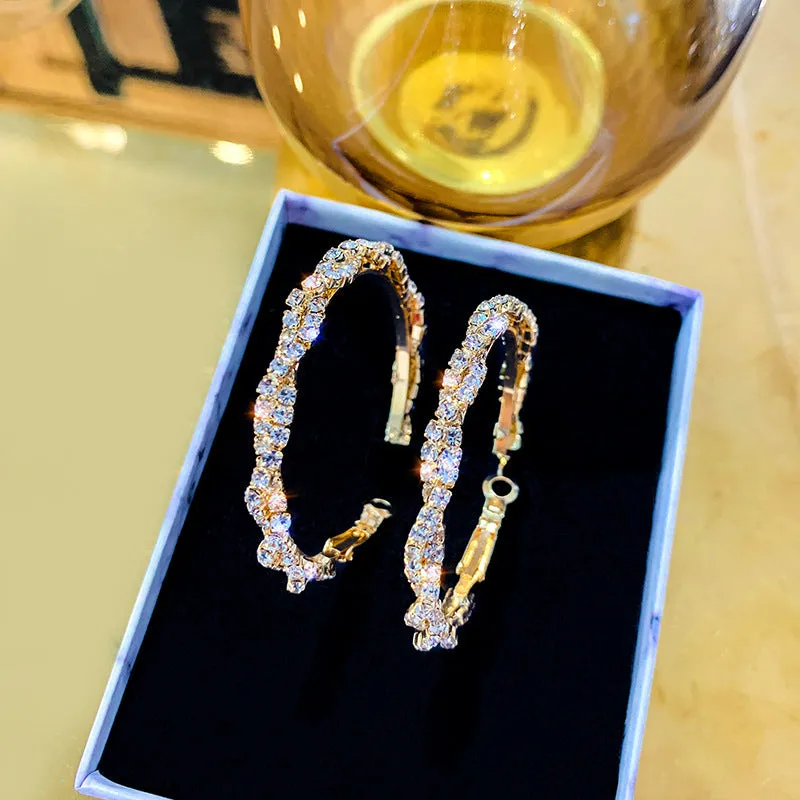 Women's silver needle alloy circle earrings with zircon stone accents