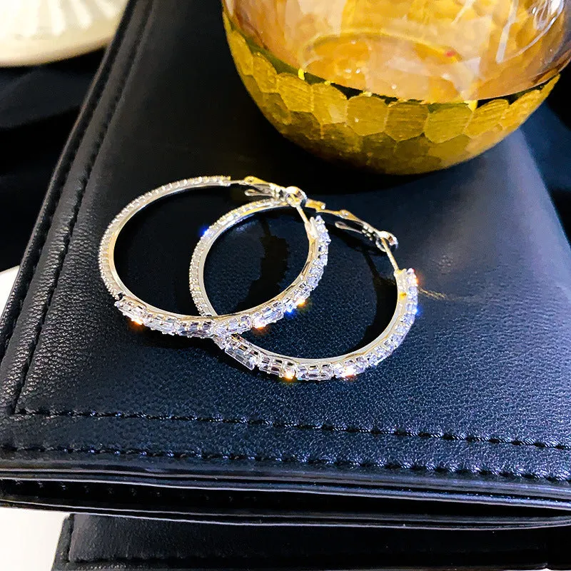 Women's silver needle alloy circle earrings with zircon stone accents