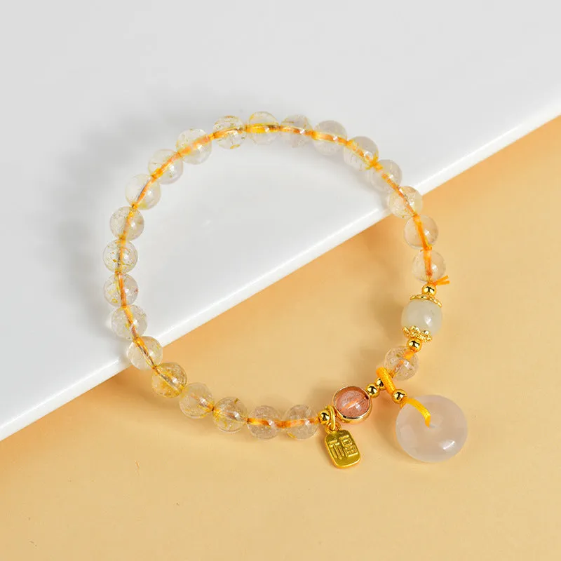Gold rutilated quartz bracelet with safety buckle and geometric pendant in national style