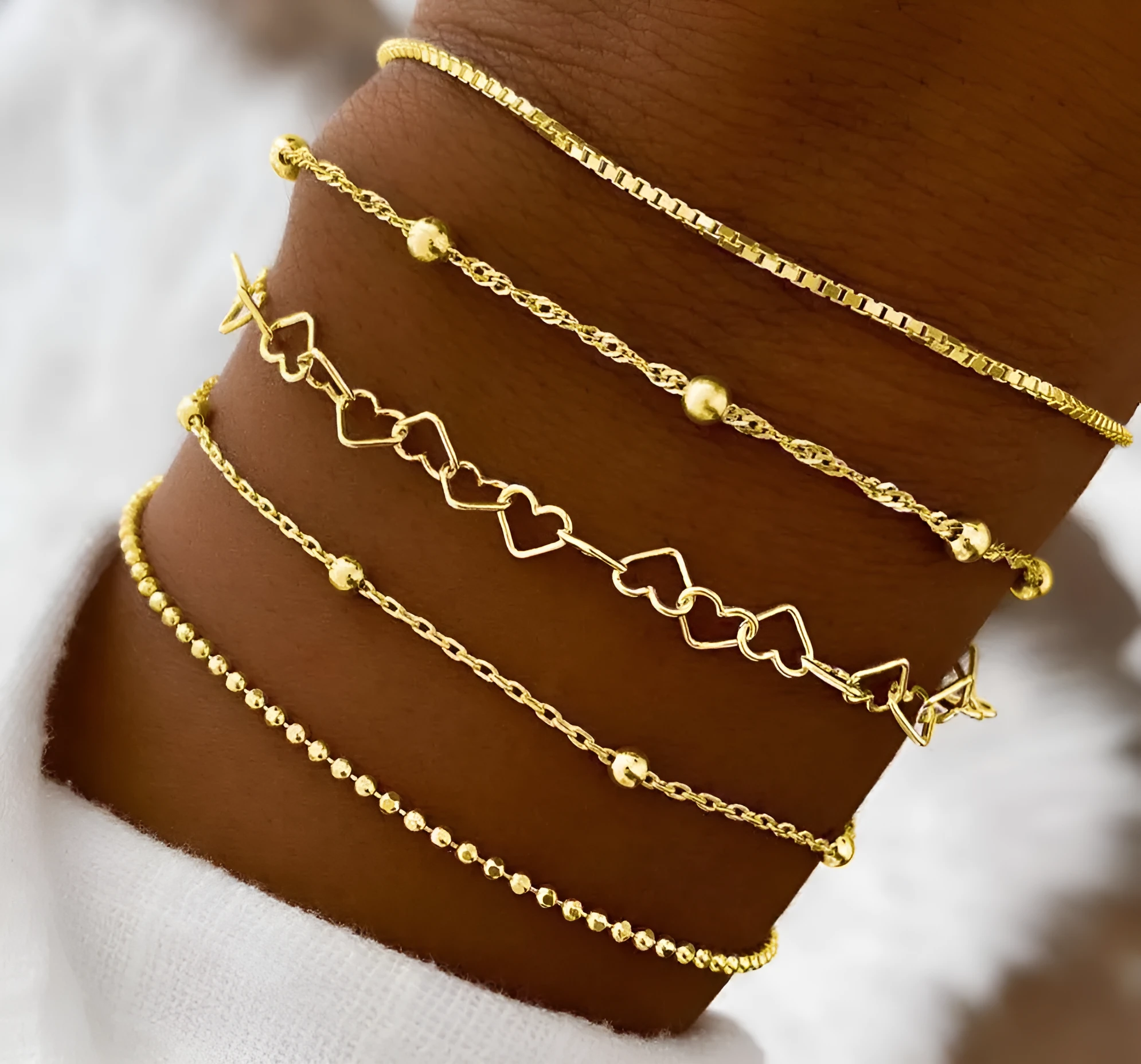 Multi-layer chain minimalist bracelet in zinc alloy with electroplated geometric finish, unisex style